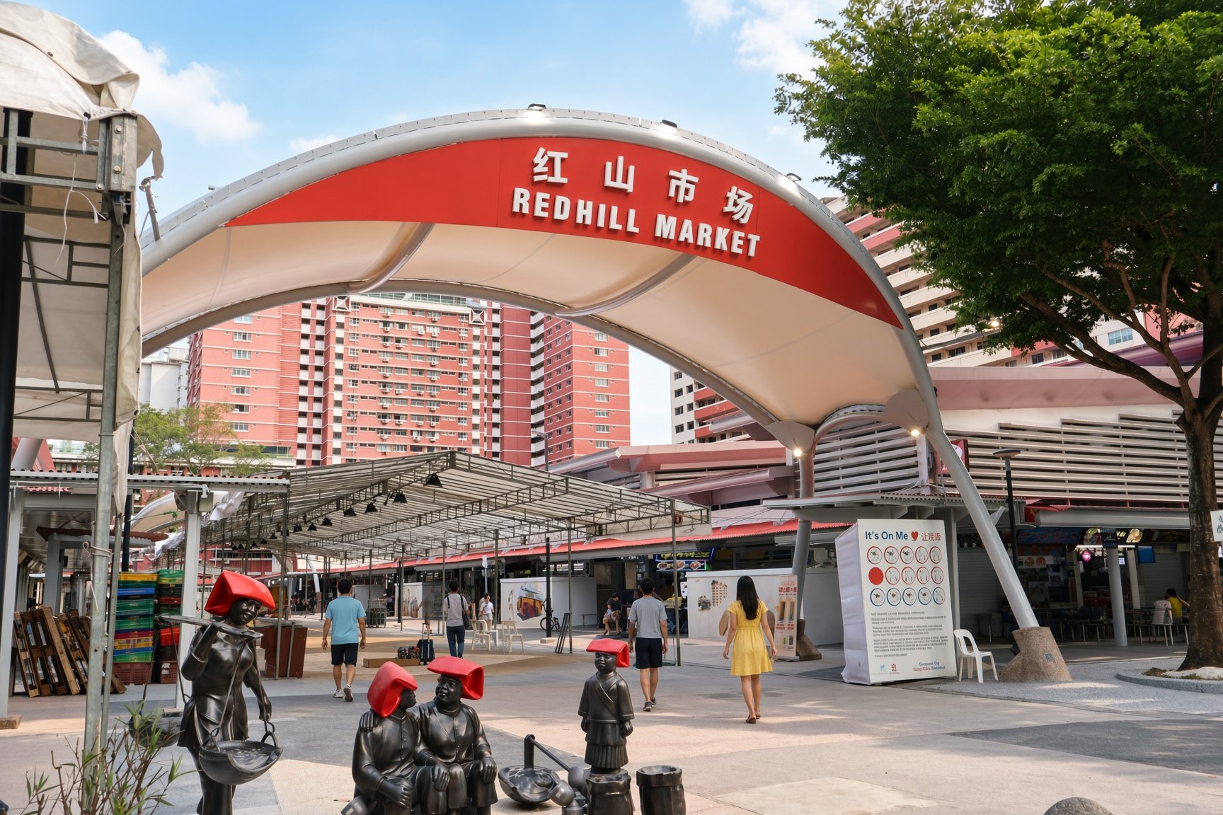 Entrance of Redhill Market with its distinctive red arch and surrounding HDB flats in Singapore.